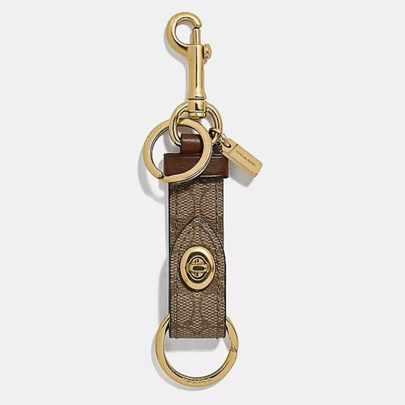 NWT!!  Coach Trigger Snap Bag Charm In Signature Canvas - Picture 1 of 5
